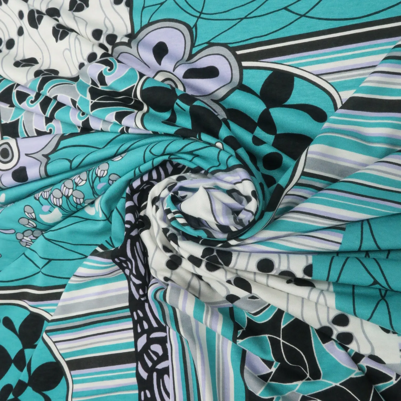 Black, Teal and White Abstract Flowers Printed Jersey Stretch Fabric