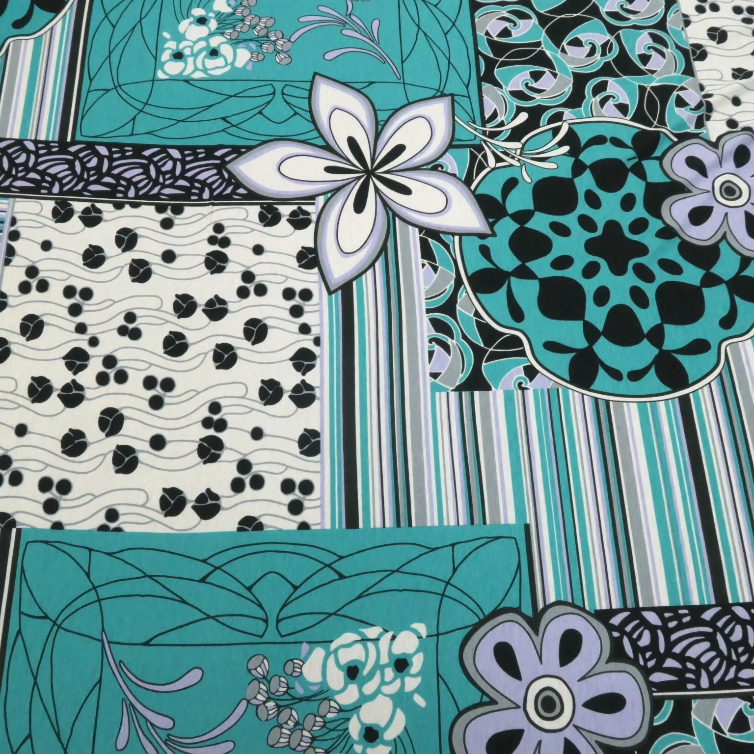 Black, Teal and White Abstract Flowers Printed Jersey Stretch Fabric