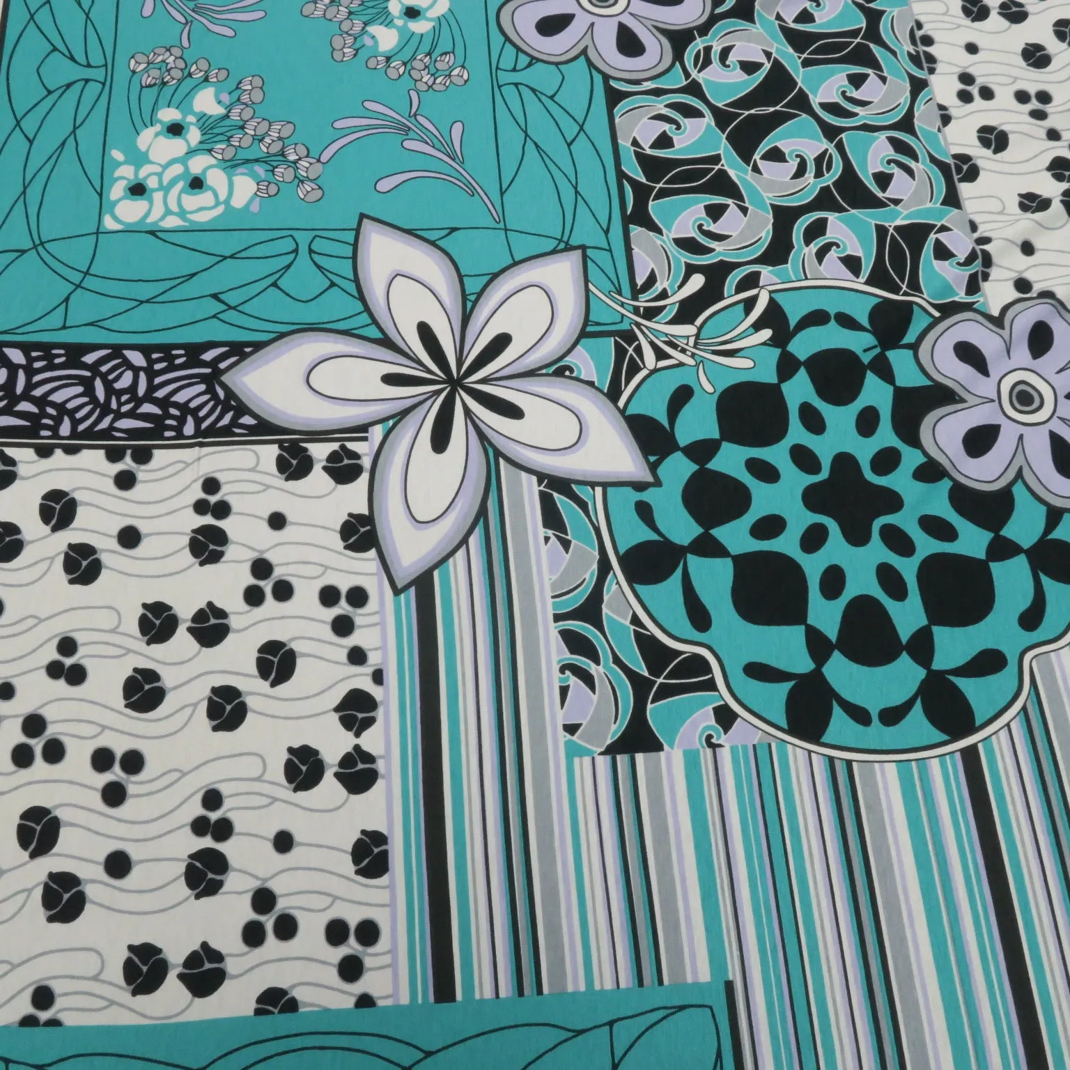 Black, Teal and White Abstract Flowers Printed Jersey Stretch Fabric